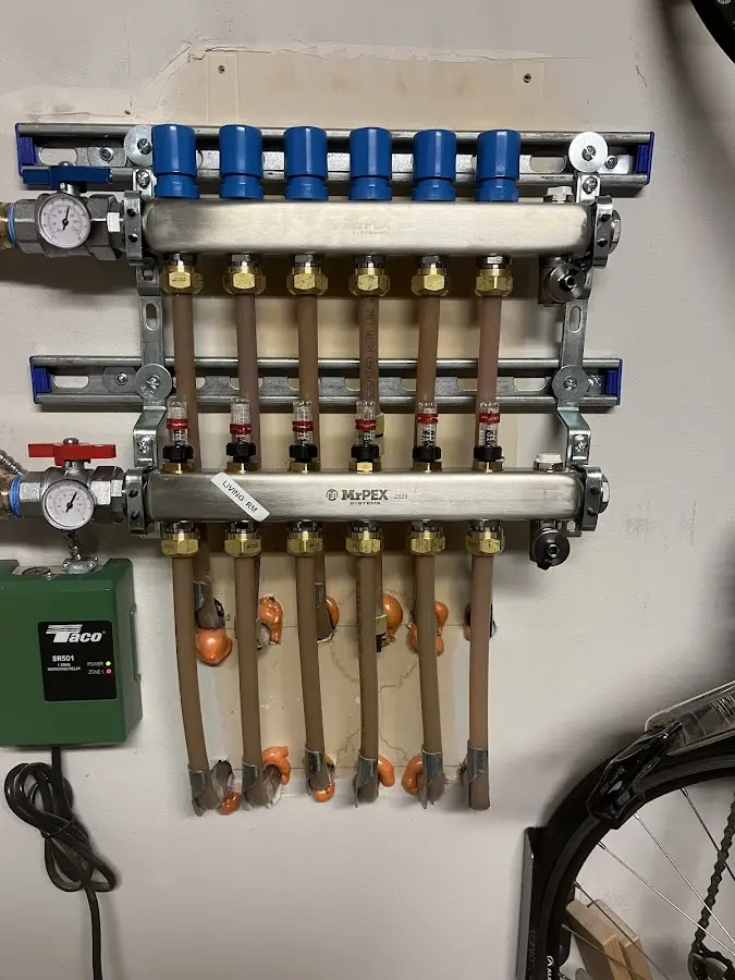 Plumber performing Water Heater Repair at a residential property in Georgetown